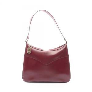 Yves Saint Laurent shoulder bag/handbag in burgundy leather.